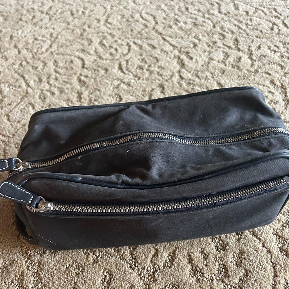 Black Coach dop kit or makeup bag